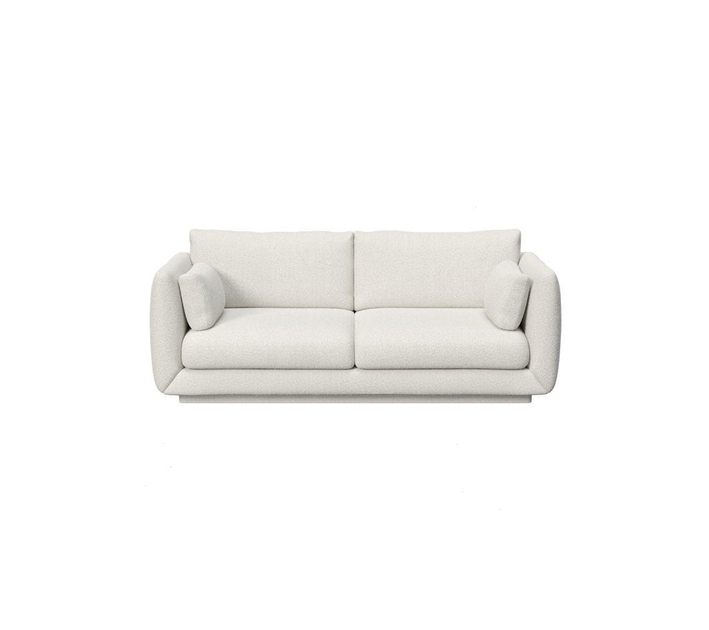 Wit modern minimalistisch sofa met afgeronde armleuningen en zachte kussens.
