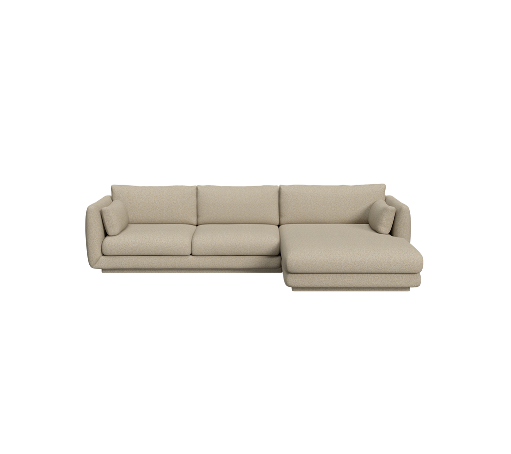 Bruine moderne bank met een chaiselong in een lounge-instelling.