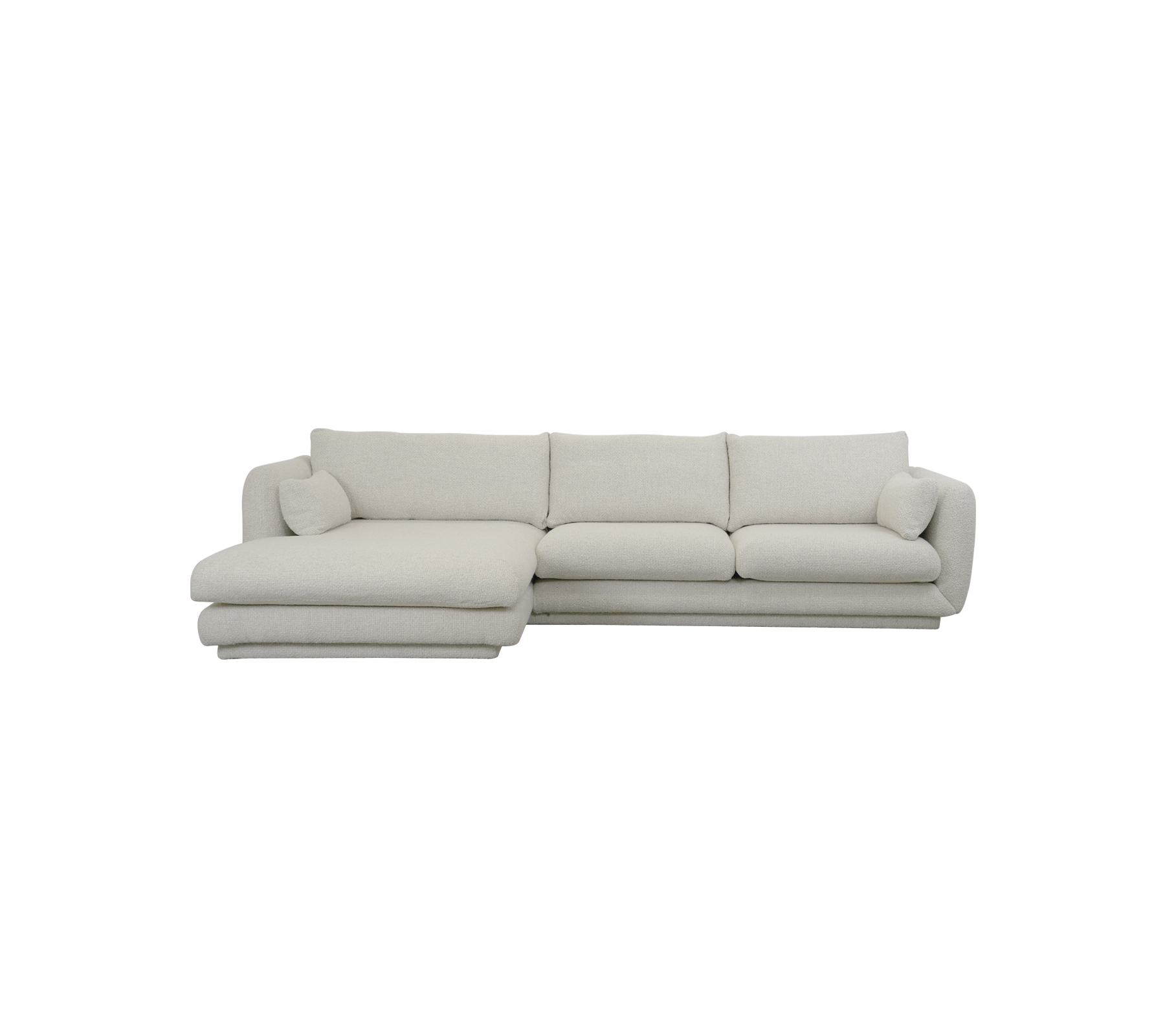 Moderne zandkleurige sectionele bank met pluche kussens.