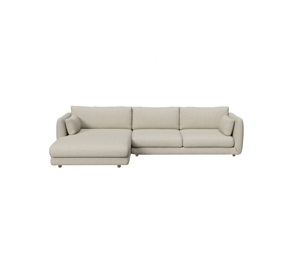 Lichtbruin modern sofa met een ruime chaise longue.
