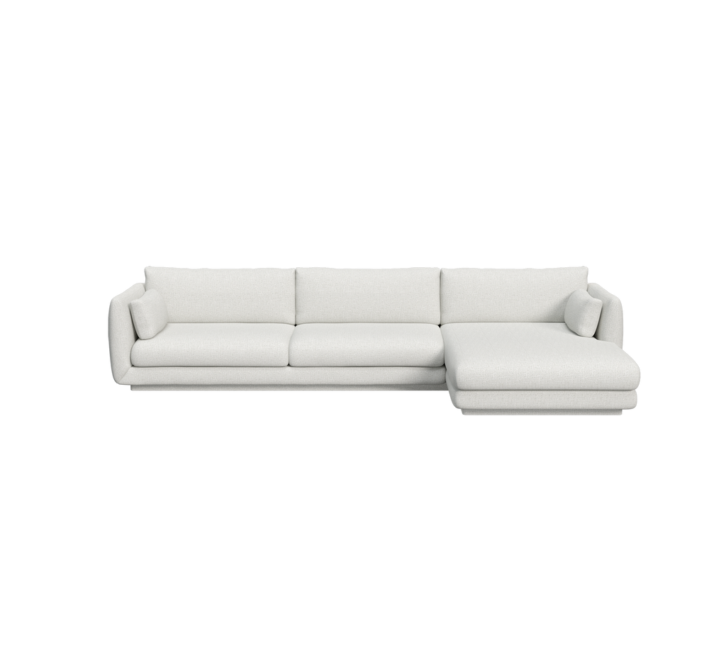 Lichtgrijze moderne sofa met een chaise longue.