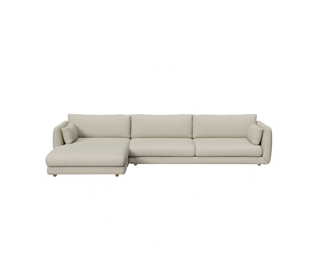 Lichtbruine moderne sofa met een chaise in een minimalistisch ontwerp.