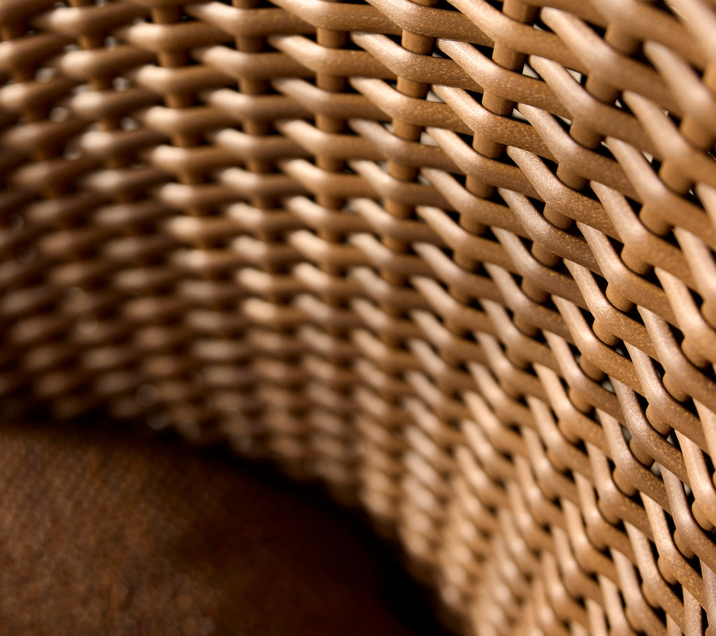 Close-up van een kustplatweef, dat ingewikkelde geweven patronen in natuurlijke tinten tentoonstelt en de textuur en ambachtelijkheid benadrukt.